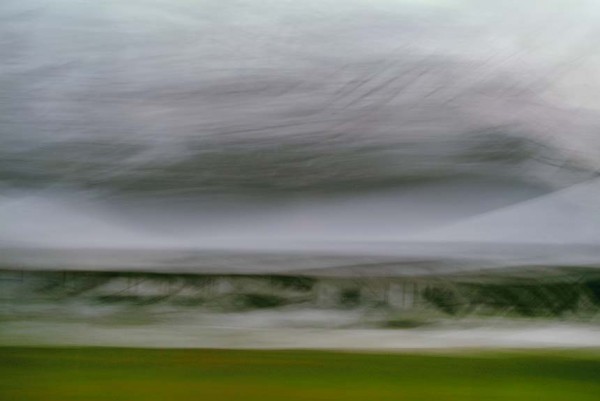 Light Signatures series, day, colour photograph, art, abstract, abstract expressionism, creative, city street, urban, downtown, cityscape, speed, blur, movement, motion, green, grey, muted, clouds, streaks, patterns