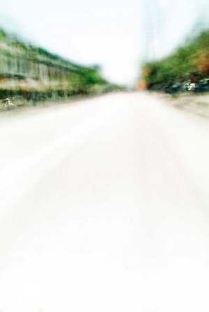 Convergent series, day, colour photograph, art, abstract, abstract expressionism, creative, city street, urban, downtown, cityscape, speed, blur, movement, motion, green, muted, wedges, shape