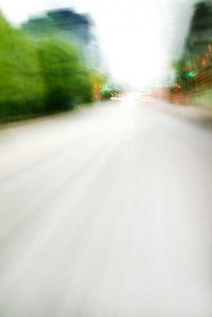 Convergent series, day, colour photograph, art, abstract, abstract expressionism, creative, city street, urban, downtown, cityscape, speed, blur, movement, motion, green, vibrant, wedge, shape