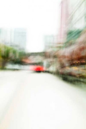 Convergent series, day, colour photograph, art, abstract, abstract expressionism, creative, city street, urban, downtown, cityscape, speed, blur, movement, motion, brown, green, red, vibrant, wedge, shape